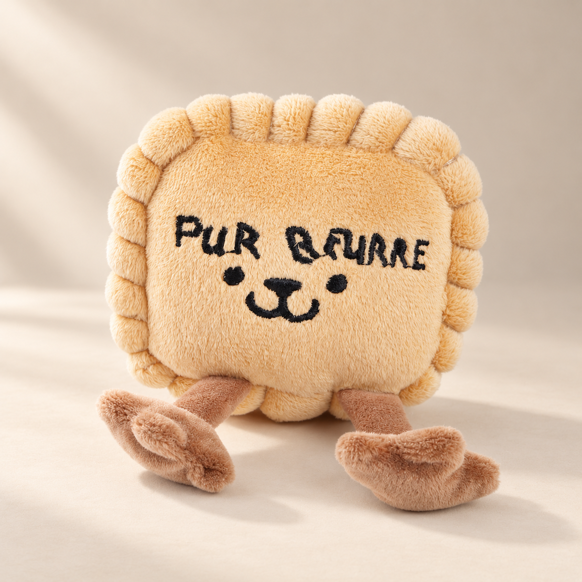 Jouet en peluche Petit beurre avec broderie Pur Beurre sur fond ivoire